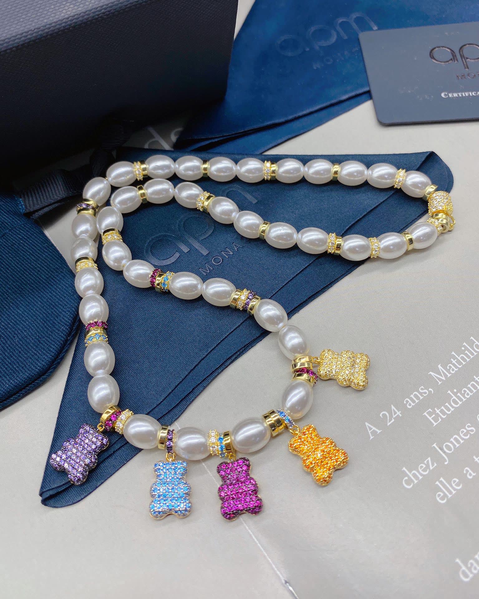 APM Monaco Pearl and Crystal Bear Charm Necklace